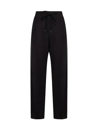 Studio Nicholson Trousers In Brown