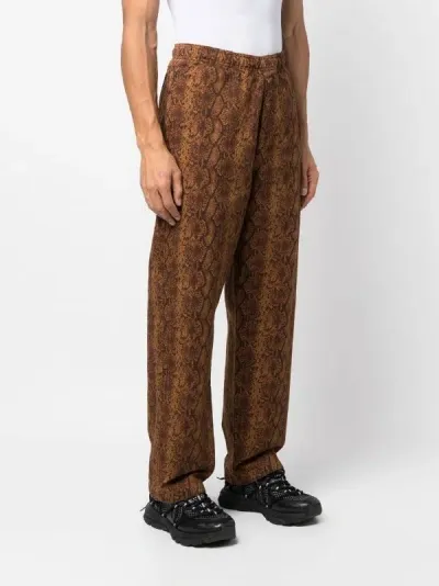 Stussy Snakeskin-print Cotton Trousers In Brown