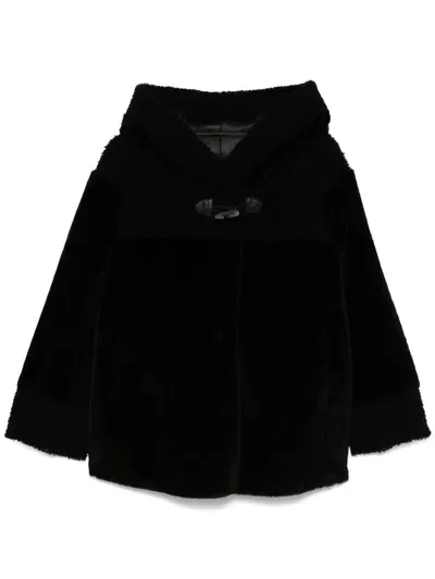 Suprema Shearling Coat In Black