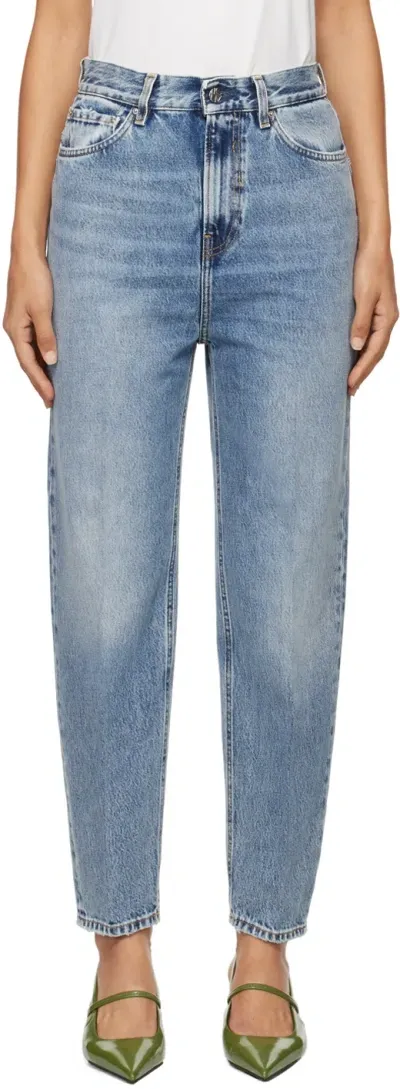 Totême Blue Tapered Leg Jeans In Worn Blue 485