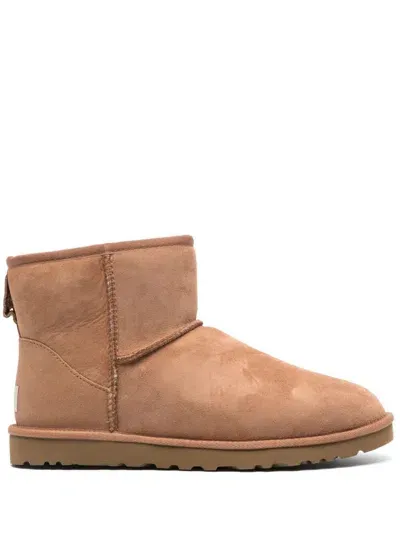 Ugg 10mm Classic Mini Shearling Boots In Brown