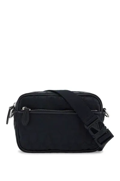 Valentino Garavani Black Iconographe Crossbody Bag In Blue