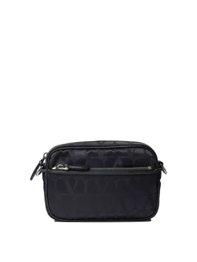 Valentino Garavani Black Iconographe Crossbody Bag In Blue