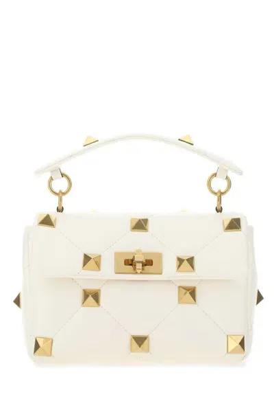 Valentino Garavani Handbags. In White