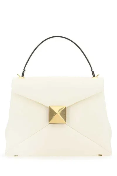 Valentino Garavani Handbags. In White