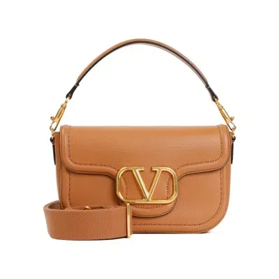 Valentino Garavani Locò Textured-leather Shoulder Bag In Brown