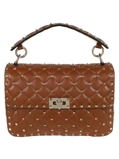 Valentino Garavani Medium Shoulder Bag Spike Rockstud In Brown