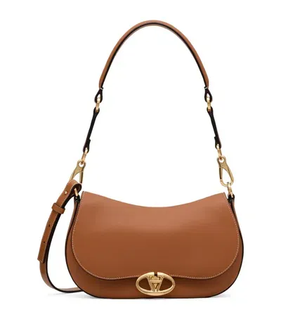 Valentino Garavani Small Leather Ohval Shoulder Bag In Brown