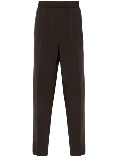 Zegna Tapered-leg Trousers In Brown