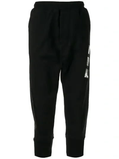 Julius Cropped Track Pants In Black