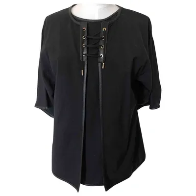 Pre-owned Ferragamo Wool Blouse In Black