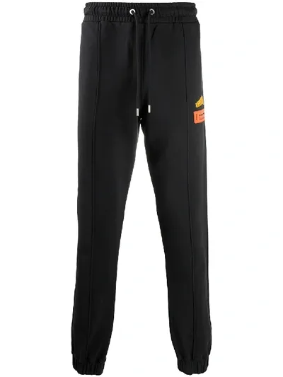 Heron Preston Cuffed Logo Sweatpants In Black