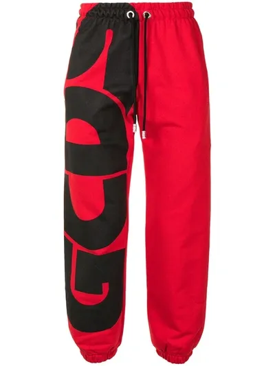 Gcds Logo-print Cotton Track Trousers In Red,black