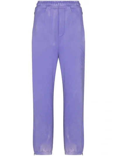 We11 Done Bleached Reflective Logo Track Trousers In Purple