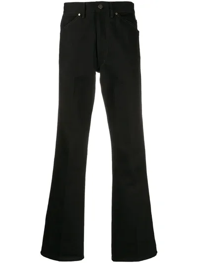 Lemaire Flared Leg Denim Trousers In Black