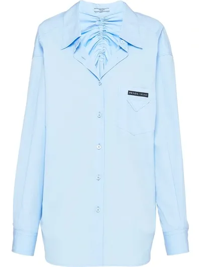 Prada Ruched Back Logo Patch Shirt In Blue