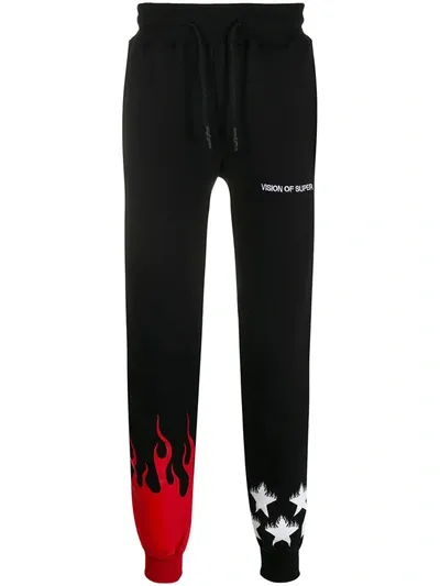 Vision Of Super Flames And Stars Print Track Pants In Black