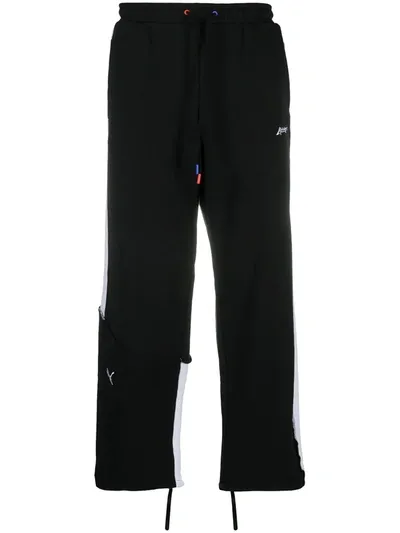 Puma Contrast-stripe Track Pants In Black