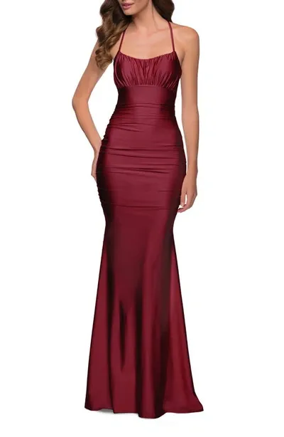 La Femme Shiny Jersey Halter Mermaid Gown In Burgundy