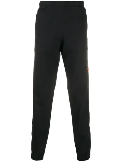 Heron Preston Logo Tape Track Trousers In Black