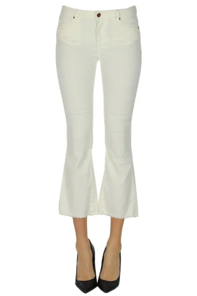 Atelier Cigala's Flared Leg Cropped Jeans In White