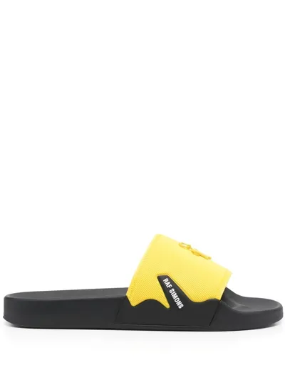 Raf Simons Embossed-logo Sliders In Yellow