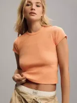 Maeve The Blair Baby Tee By : Cropped Edition In Orange