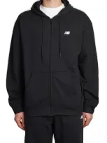 New Balance Logo Printed Zipped Drawstring Hoodie In Black